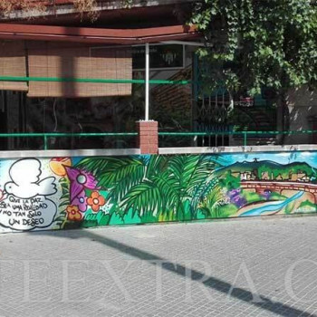 Decoración mural profesional en graffiti muro exterior Peña Bética Rubí - ArteExtra
