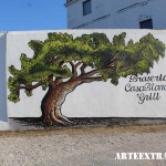 Mural decorativo graffiti en tapia pared exterior de restaurante Terrassa - Arte Extra