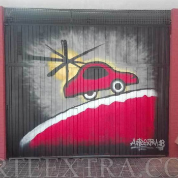 Decoración puerta parking en graffiti inspiración Miró   realizado por ArteExtra